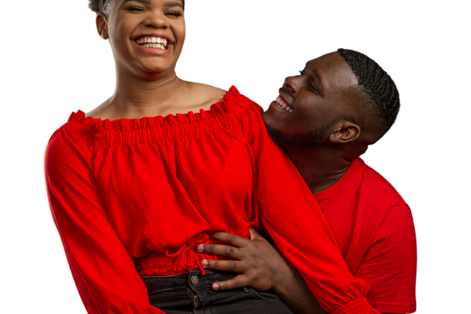 couple wearing red shirts flirting and looking happy with each other