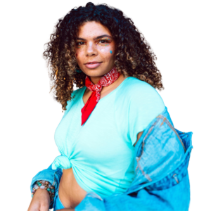 woman with curly hair looking into camera