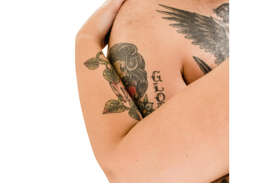 couple embracing with tattoos