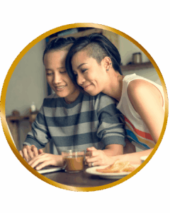 queer asian couple looking at computer