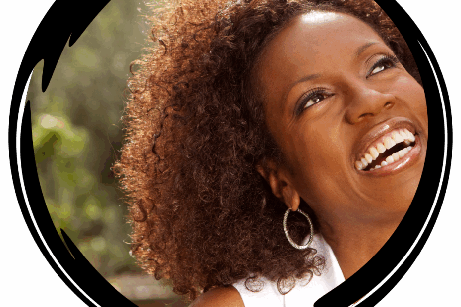 black woman looking up and smiling