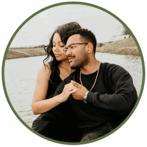 couple holding hands and looking into distance