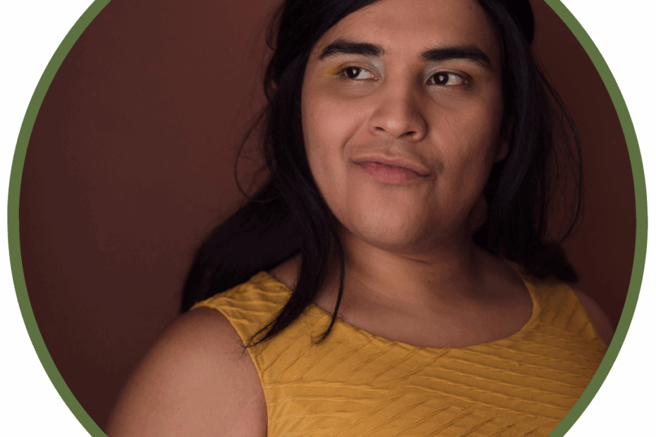 queer person looking thoughtful and hopeful