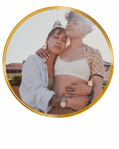 queer women embracing and looking content