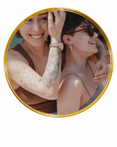 queer couple looking happy