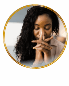 black woman looking concerned and stressed touching her face