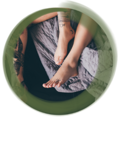 lovers feet in bed