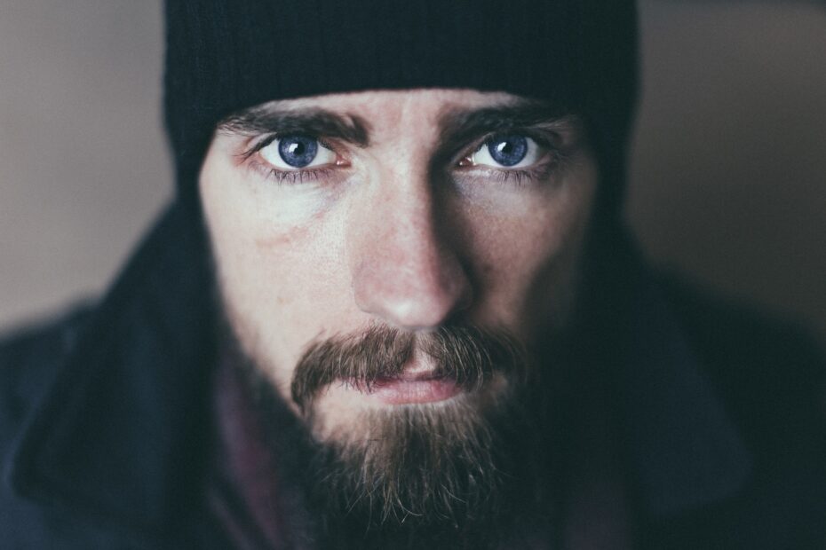man serious blue eyes
