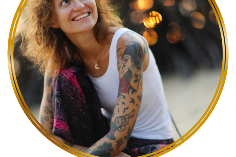 smiling woman with tattoos